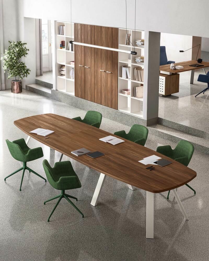 Tavolo riunioni sagomato di colore Noce Boheme con gambe disponibili in NERO o BIANCO, con piano il nobilitato melaminico.
